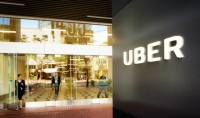 Сервиc заказа такси Uber начнет страховать водителей и пассажиров